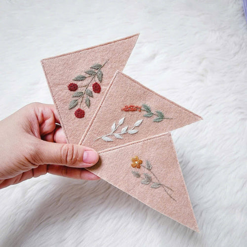 Minimal floral bookmark hand-embroidered on linen with a soft tassel