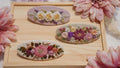 Floral barrette hand-embroidered on linen with a metal clip