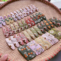 Embroidered floral linen hair clip, another view