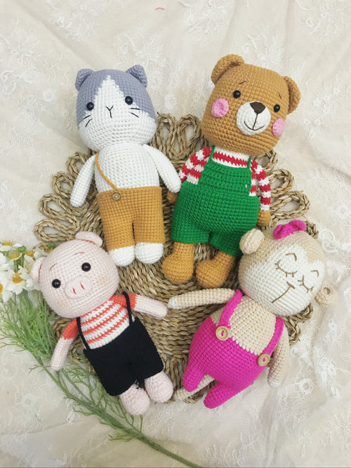 Handmade crochet cat, bear, pig and monkey plush set in knitted outfits
