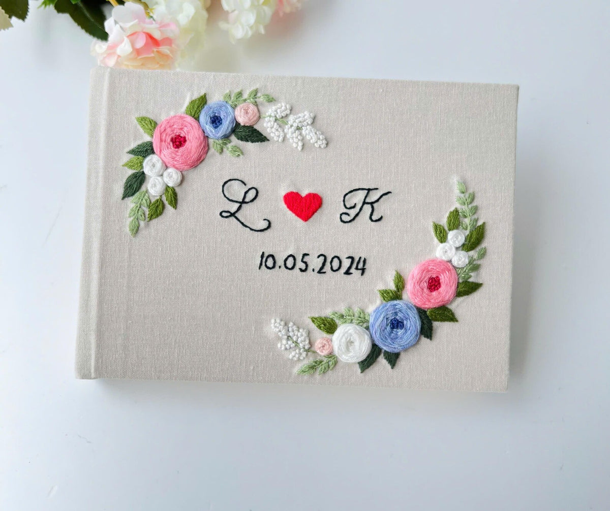 Monogram Wreath Guest Book by The Thread Nest, hand-embroidered linen cover, photo 1