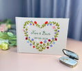 Floral Heart Wedding Guest Book by The Thread Nest, hand-embroidered linen cover, photo 3