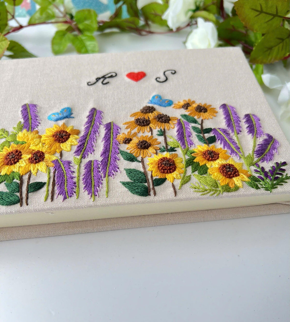 Sunflower & Lavender Guest Book with Initials by The Thread Nest, hand-embroidered linen cover, photo 4