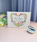 Floral Heart Wedding Guest Book by The Thread Nest, hand-embroidered linen cover, photo 2