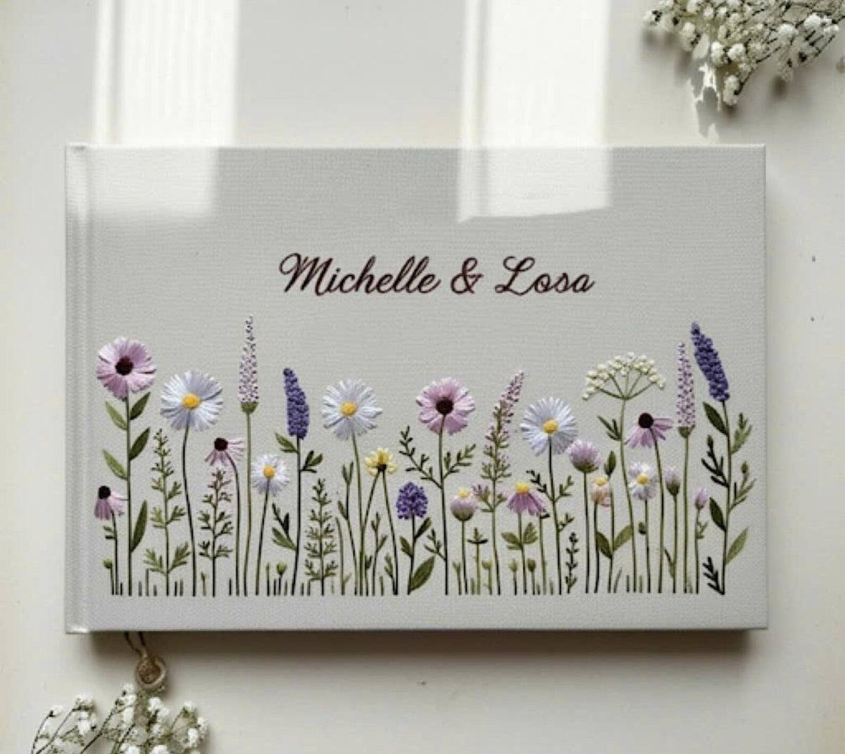 Wedding Guest Book with Names & Wildflowers by The Thread Nest, hand-embroidered linen cover, photo 1