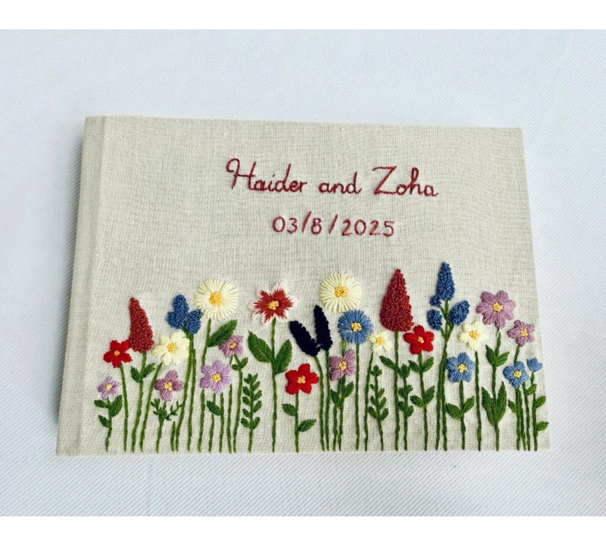 Wedding Guest Book with Names & Wildflowers by The Thread Nest, hand-embroidered linen cover, photo 4
