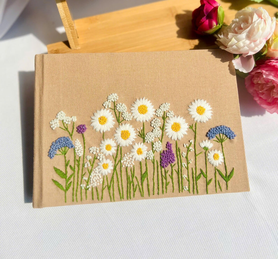 Daisy Meadow Guest Book by The Thread Nest, hand-embroidered linen cover, photo 1