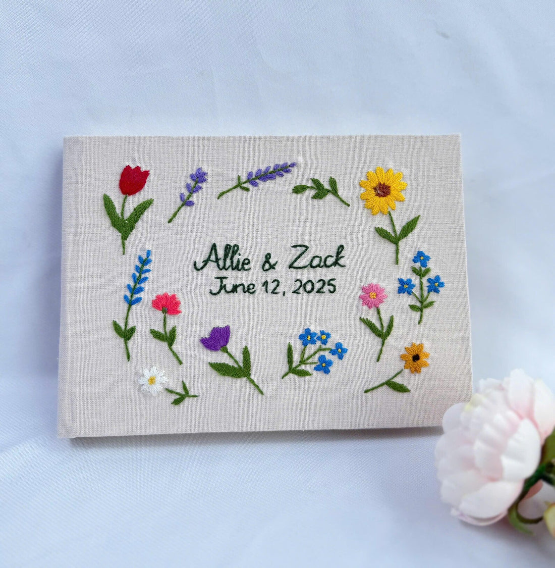 Floral Wreath Guest Book, Personalised by The Thread Nest, hand-embroidered linen cover, photo 1