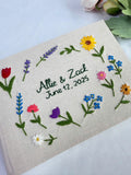 Floral Wreath Guest Book, Personalised by The Thread Nest, hand-embroidered linen cover, photo 3