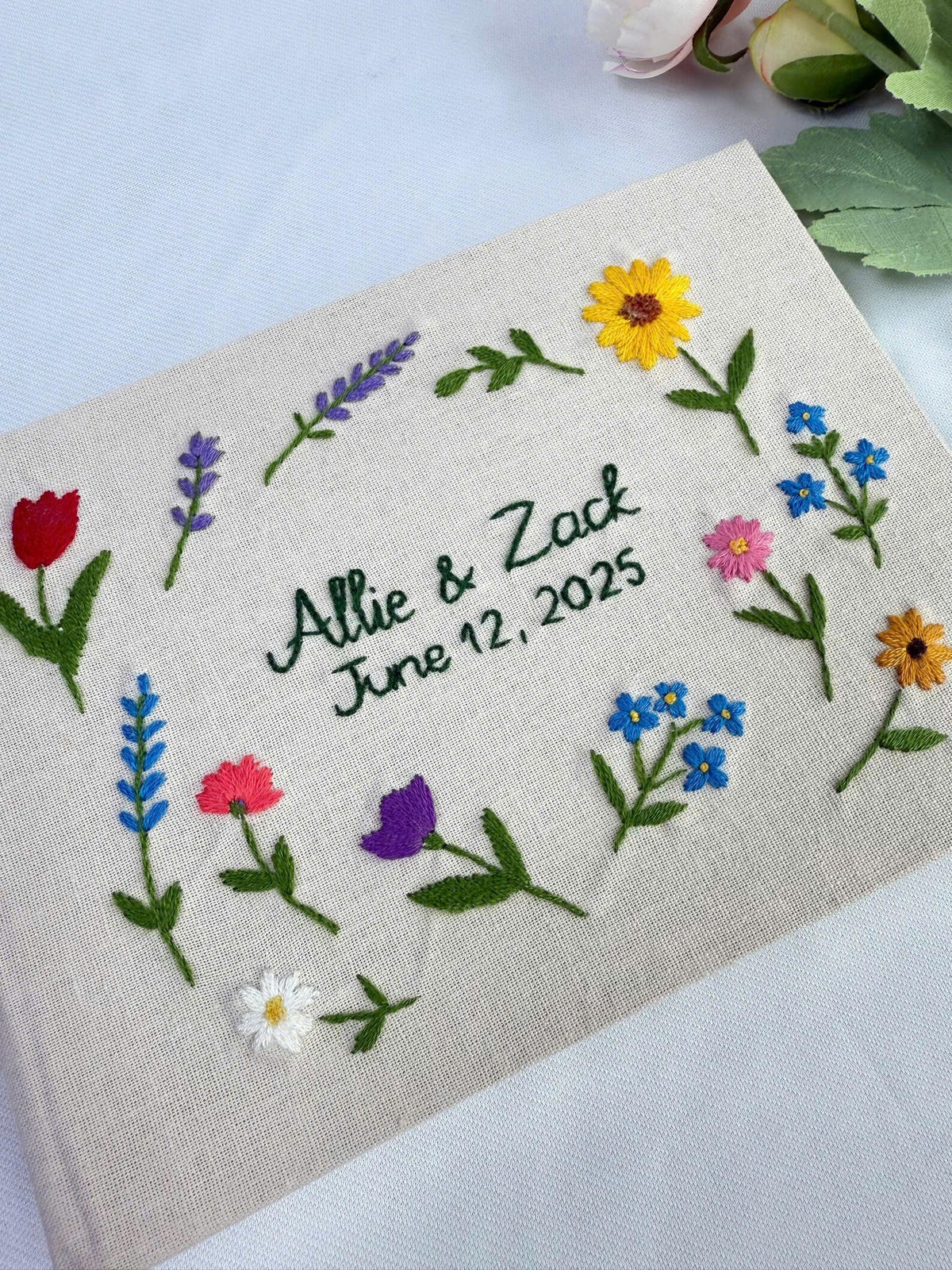 Floral Wreath Guest Book, Personalised by The Thread Nest, hand-embroidered linen cover, photo 3