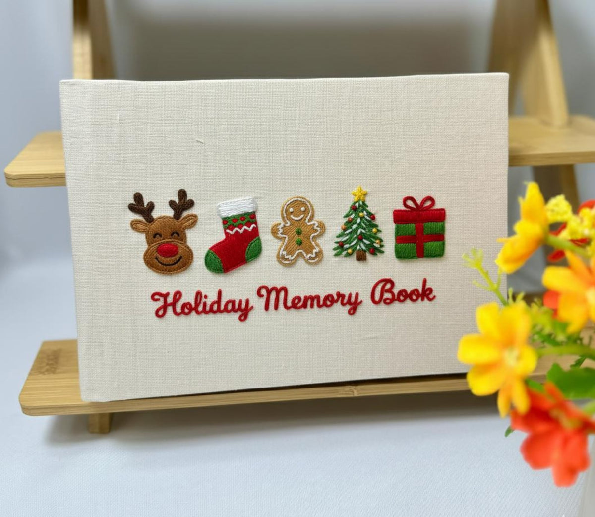 Christmas Memory Book, Personalised by The Thread Nest, hand-embroidered linen cover, photo 4