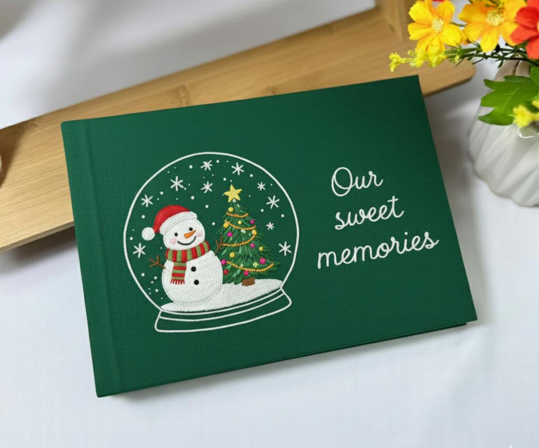 Christmas Memory Book, Personalised by The Thread Nest, hand-embroidered linen cover, photo 1
