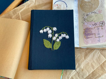 Lily of the Valley Embroidered Journal by The Thread Nest, hand-embroidered linen cover, photo 1