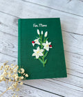 Lily & Ladybird Embroidered Journal A5 by The Thread Nest, hand-embroidered linen cover, photo 1
