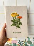 Marigold Embroidered Journal A5, Personalise the Cover by The Thread Nest, hand-embroidered linen cover, photo 4