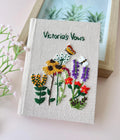 Personalised Vow Book, Mountain or Floral by The Thread Nest, hand-embroidered linen cover, photo 4