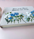 Personalised Wedding Guest Book, Names & Date by The Thread Nest, hand-embroidered linen cover, photo 2