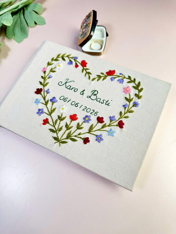 Floral Heart Wedding Guest Book by The Thread Nest, hand-embroidered linen cover, photo 1