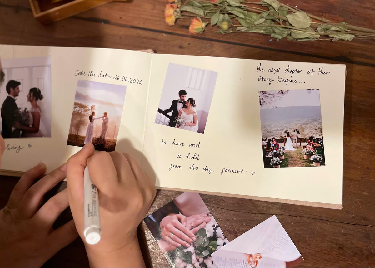 An open scrapbook with wedding photographs and handwritten notes