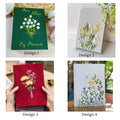Four rectangular photo albums with embroidered floral designs — hand-embroidered by The Thread Nest