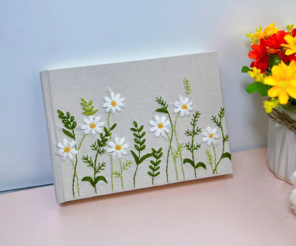 Wildflower & Daisy Guest Book, Personalised by The Thread Nest, hand-embroidered linen cover, photo 5