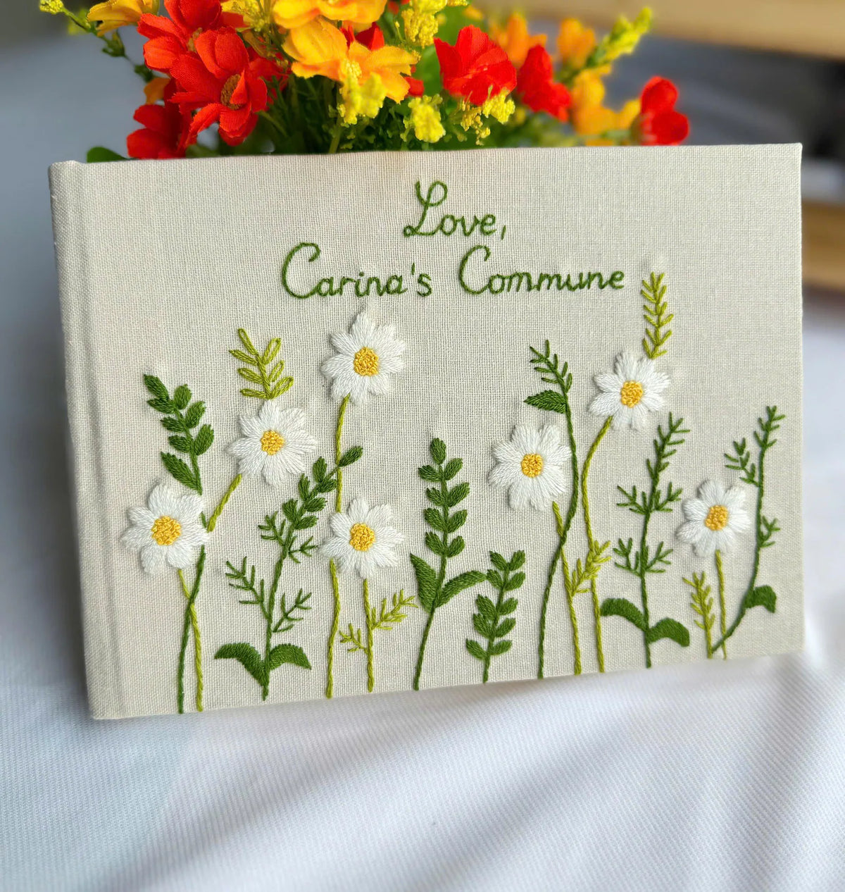 White Daisy Guest Book, Personalised by The Thread Nest, hand-embroidered linen cover, photo 2