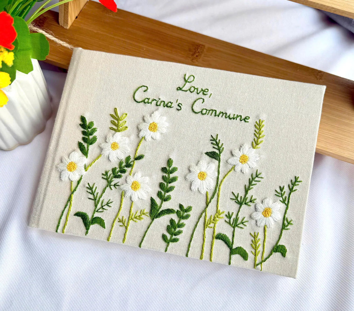 White Daisy Guest Book, Personalised by The Thread Nest, hand-embroidered linen cover, photo 1