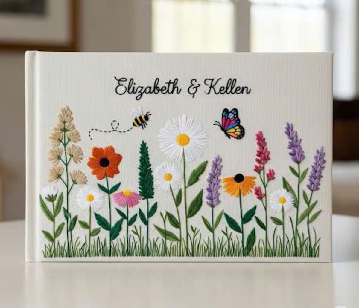 Wildflower & Daisy Guest Book, Personalised by The Thread Nest, hand-embroidered linen cover, photo 2