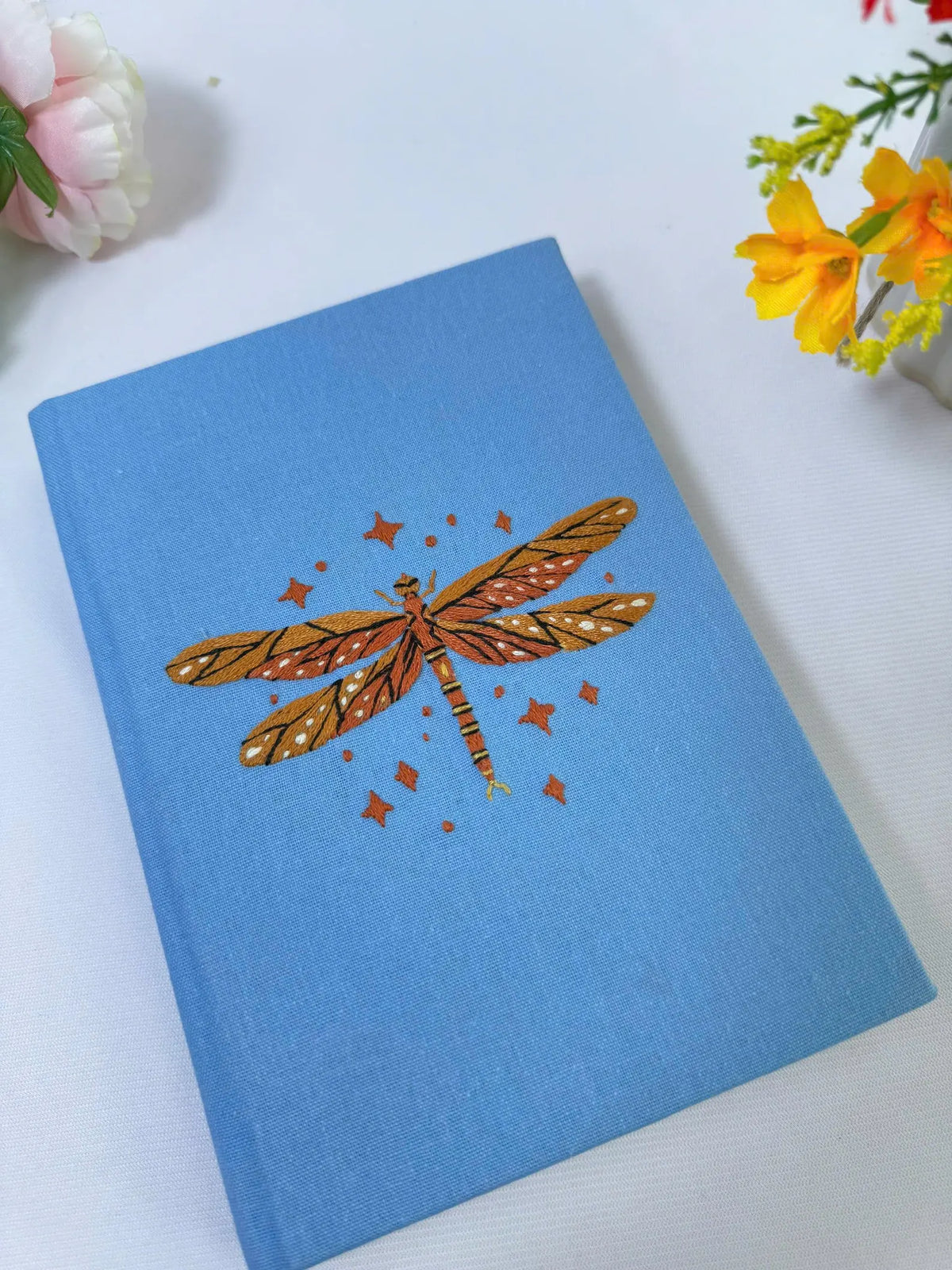 Dragonfly Embroidered Journal by The Thread Nest, pale blue linen cover with a hand-embroidered dragonfly, photo 4