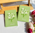 White Bouquet Vow Book by The Thread Nest, hand-embroidered linen cover, photo 7