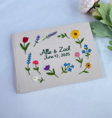 Floral Wreath Guest Book, Personalised by The Thread Nest, hand-embroidered linen cover, photo 1