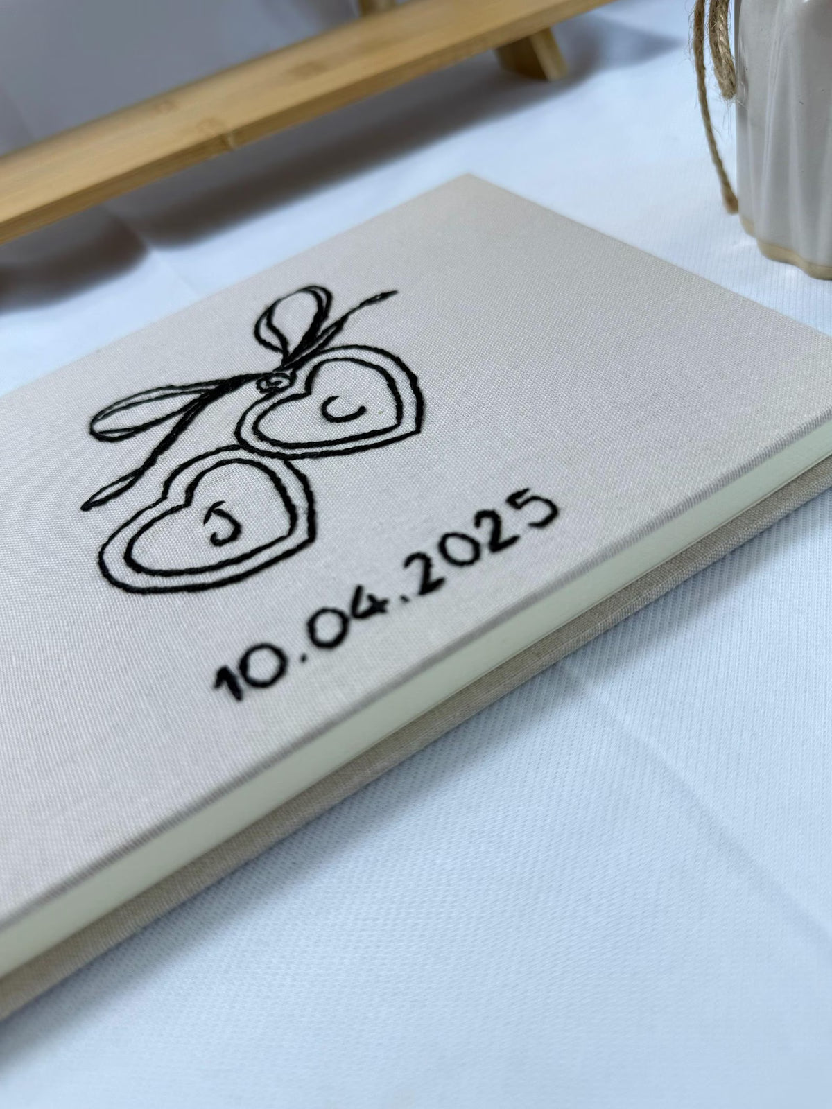 Wedding Guest Book, Line-Art Designs by The Thread Nest, hand-embroidered linen cover, photo 10