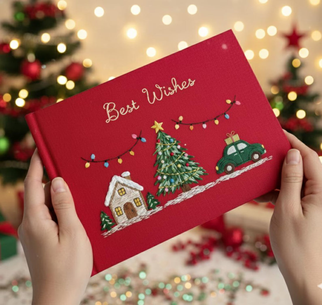 Christmas Memory Book, Personalised by The Thread Nest, hand-embroidered linen cover, photo 1