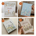 Four personalized books with floral embroidery — hand-embroidered by The Thread Nest