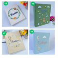A hand-embroidered linen photo album by The Thread Nest