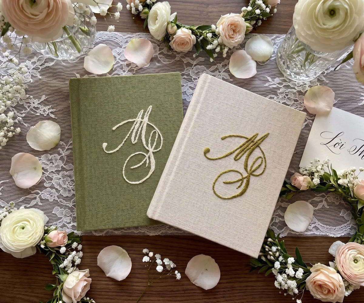 Wedding Vow Book with Names & Date by The Thread Nest, hand-embroidered linen cover, photo 3