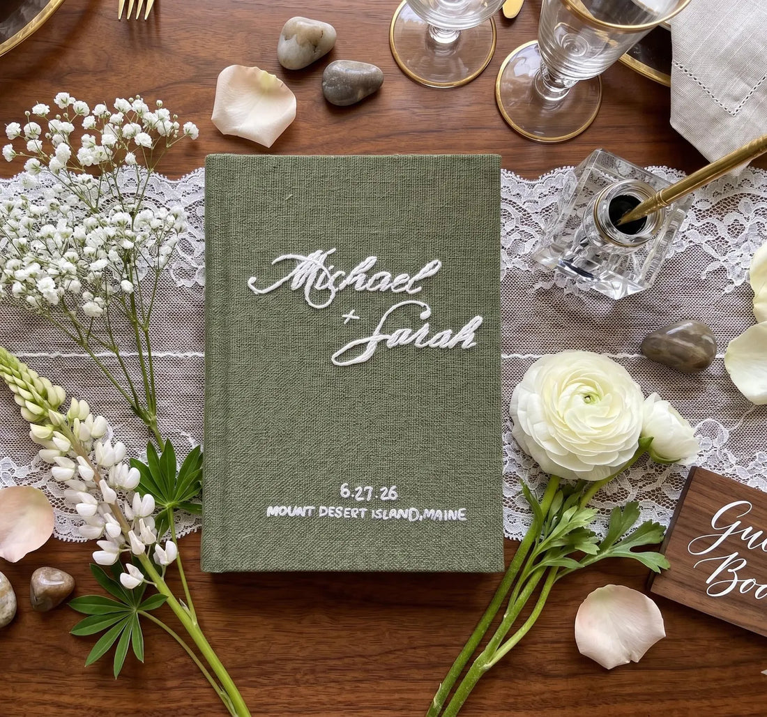Wedding Vow Book with Names & Date by The Thread Nest, hand-embroidered linen cover, photo 1